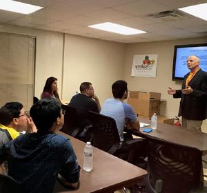 Engaged listeners lean forward with interest as safety director, Dr. Richard Costello, delivers one of his fascinating lectures.